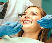 Braces patient undergoing dental checkup