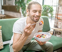 Patient in Ellicott City eating after removing Invisalign